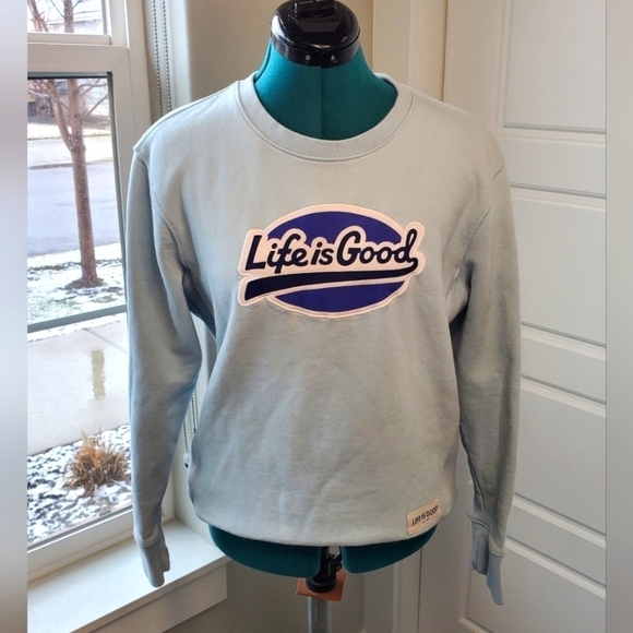 LIFE IS GOOD LIGHT BLUE SWEATSHIRT WOMEN SIZE SMALL PATCH FRONT SPELLOUT - Picture 1 of 13